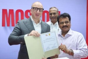 Evgeny Kozlov, First Deputy Head of the Office of the Mayor and the Government of Moscow with Atul Patne