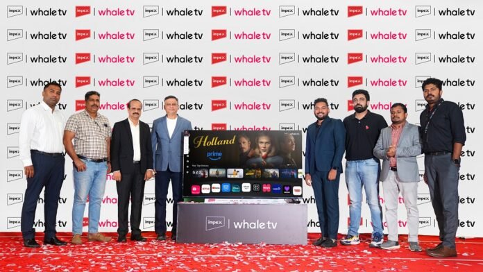 The Impex team along with the Whale TV official during the launch of Impex QLED TV with Whale OS 10 at the Gokulam Park Convention Centre, Kochi, the other da