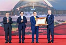 Vietnam’s Party General Secretary To Lam presents the First-Class Labor Order to Mr. Pham Nhat Vuong– Chairman of Vingroup – in recognition of the Group’s outstanding achievements, at the National Exhibition Fair Center in Hanoi, Vietnam