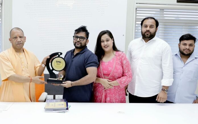 L - R Chief Minister Yogi Adityanath, Sambhav Jain, Smt. Vedika Trivedi, Shri Kunal Sharma, Shri, and Rachit Sharma L - R Chief Minister Yogi Adityanath, Sambhav Jain, Smt. Vedika Trivedi, Shri Kunal Sharma, Shri, and Rachit Sharma